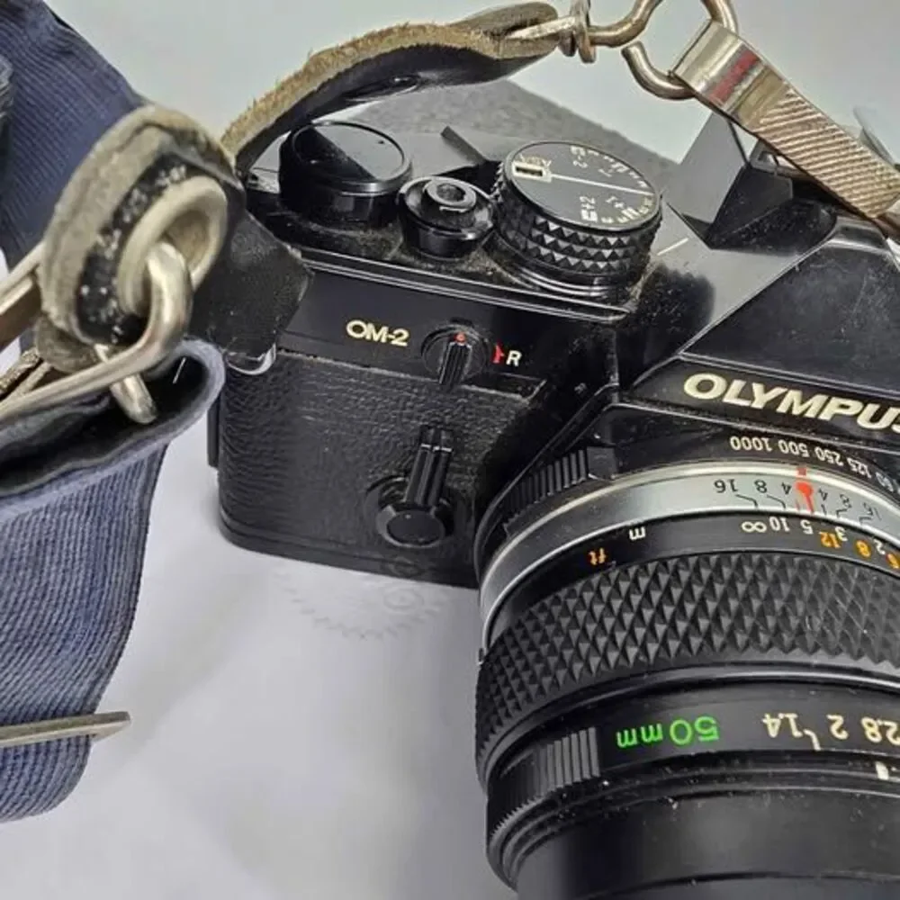 Olympus OM-2 35mm Film Camera + Zuiko 50mm f/1.4 Lens Silver